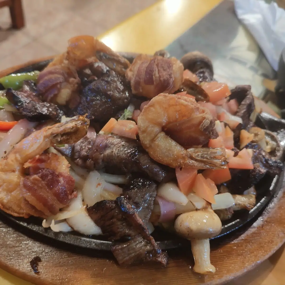 Steak Fajitas with Bacon Wrapped Shrimp
