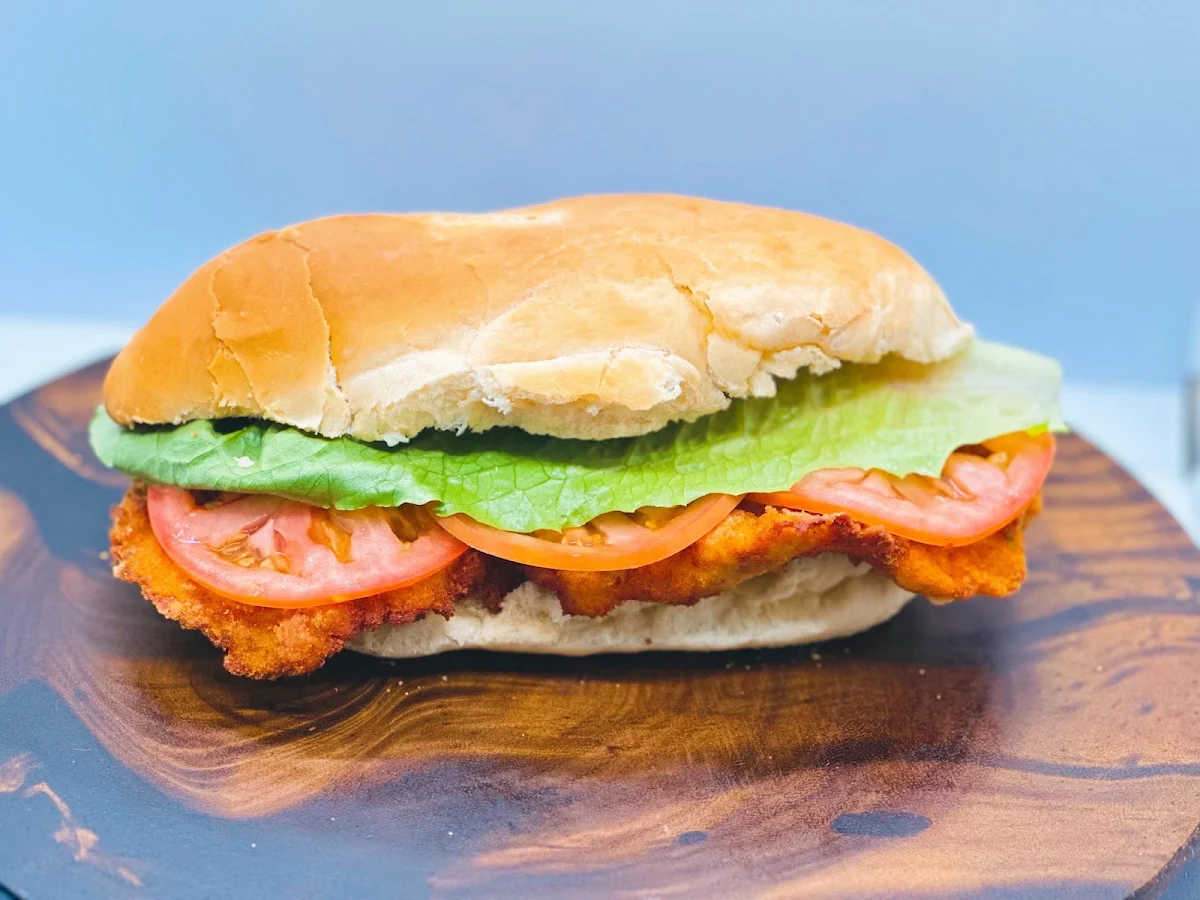 Chicken Cutlet Sandwich with Mayonnaise Lettuce and Tomato