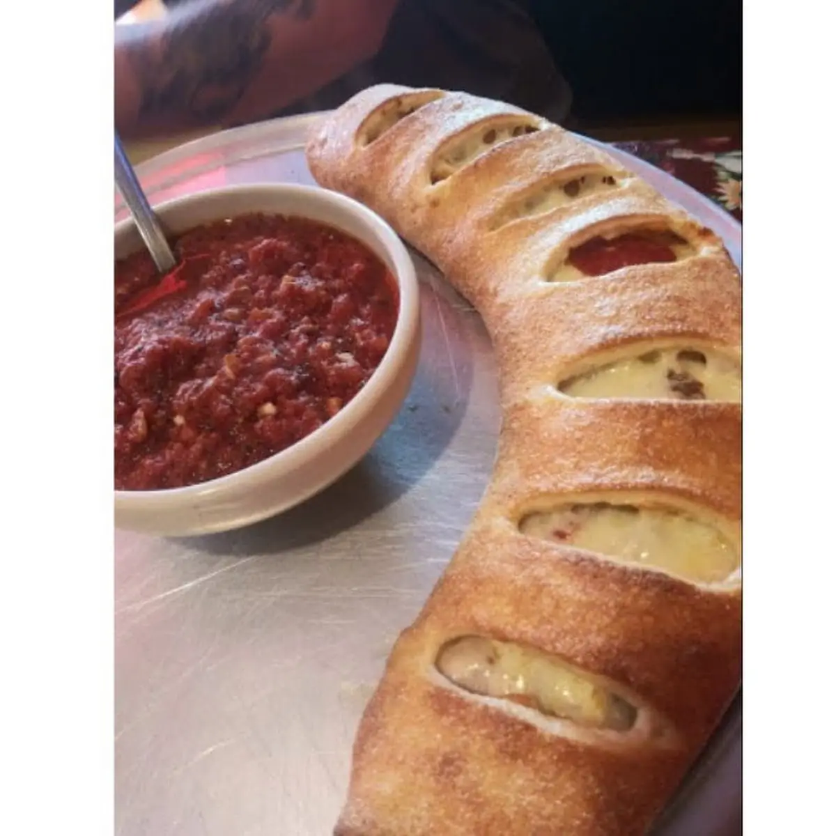 Meat Stromboli and Small Cheese Pizza
