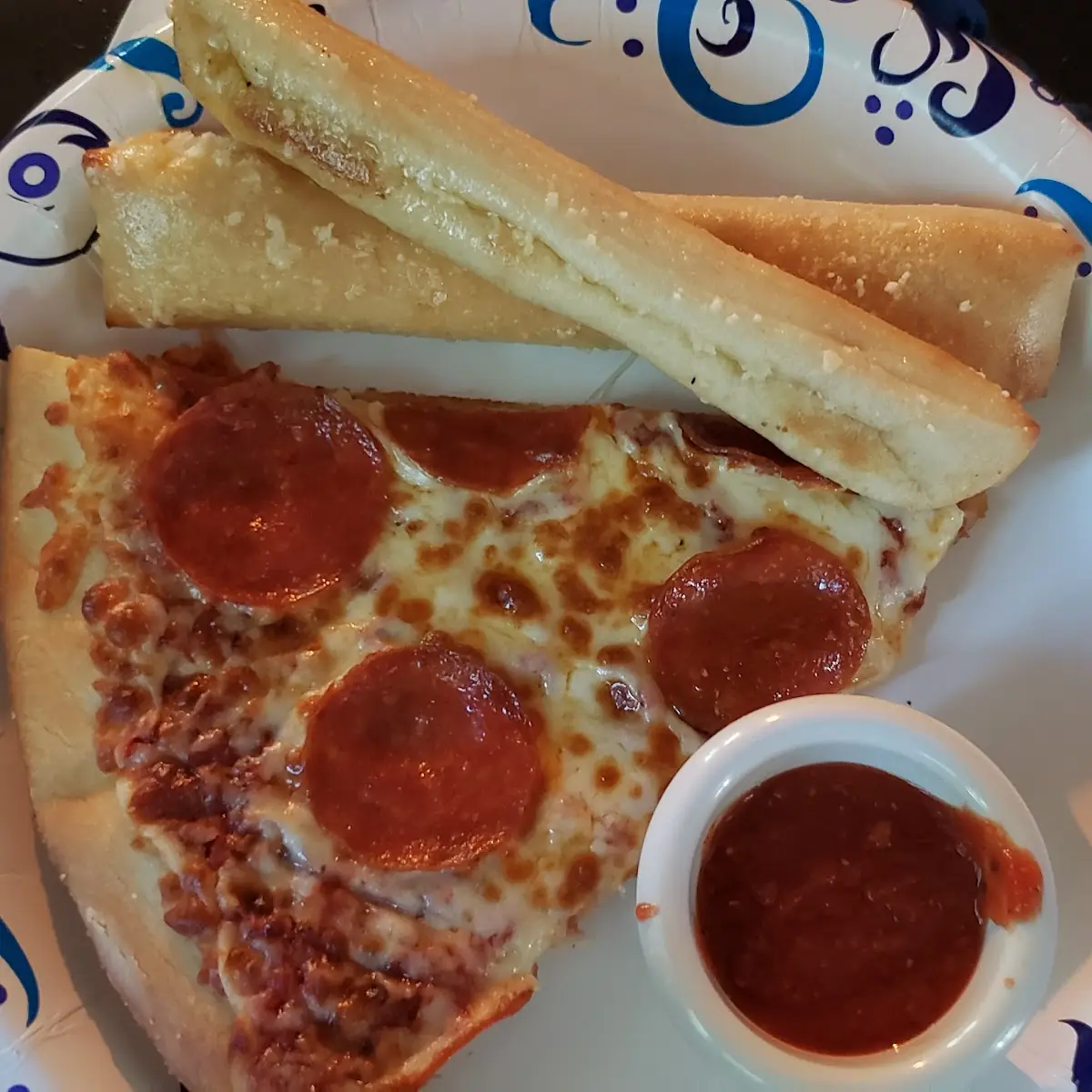 Slice Pepperoni Pizza and Bread Sticks