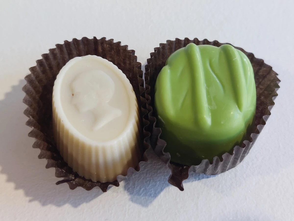 Left White Chocolate Raspberry Balsamic Truffle Right Key Lime Coconut Truffle