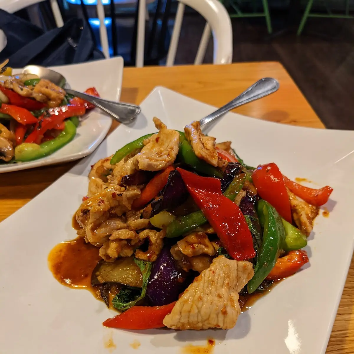 Sautéed Fresh Eggplant with Our Secret Homemade Chili Paste Basil and Bell Peppers