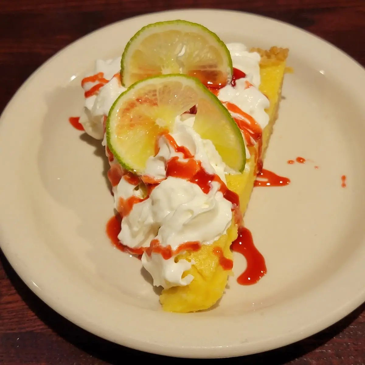 Key Lime Pie with Raspberry Coulis
