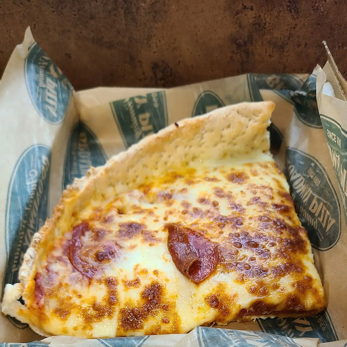 Deep Dish Pepperoni Pizza Slice