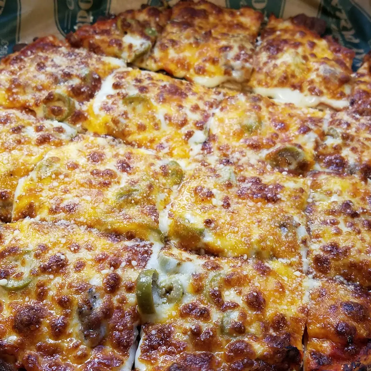 Pepperoni Sausage and Green Olive Pizza
