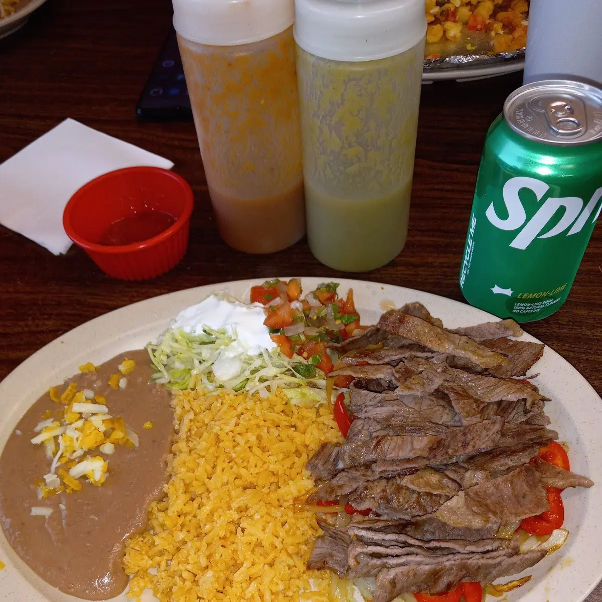 Beef Enchiladas Rice and Refried Beans
