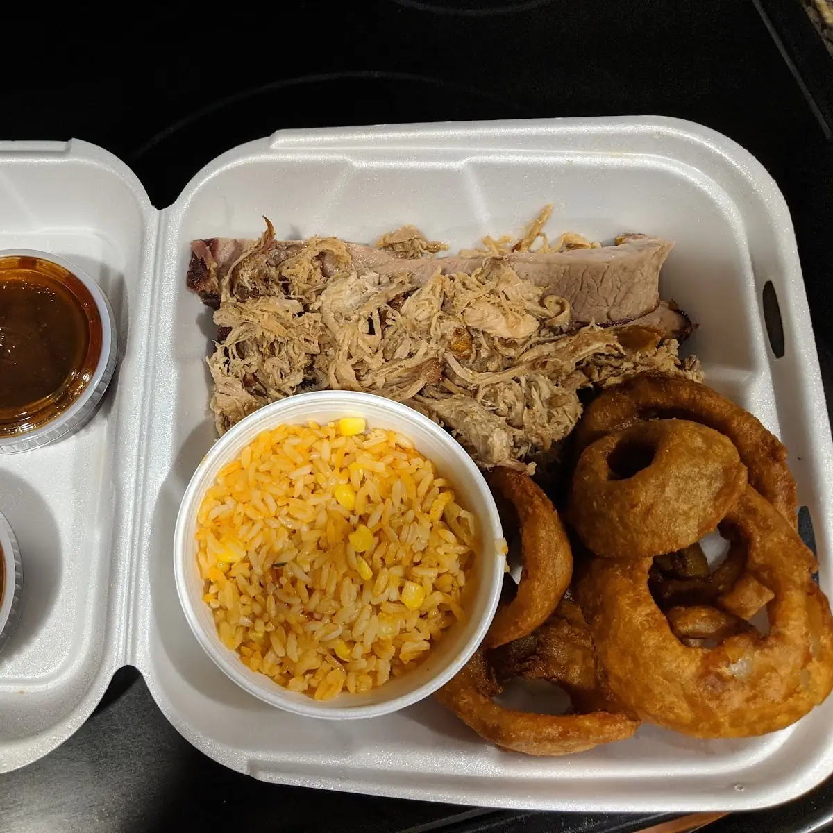 BBQ Duos Pulled Pork and Brisket with Onion Rings and Spanish Rice