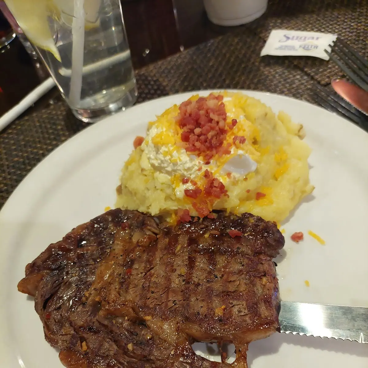 8 Oz Ribeye Steak with Loaded Mashed Potatoes
