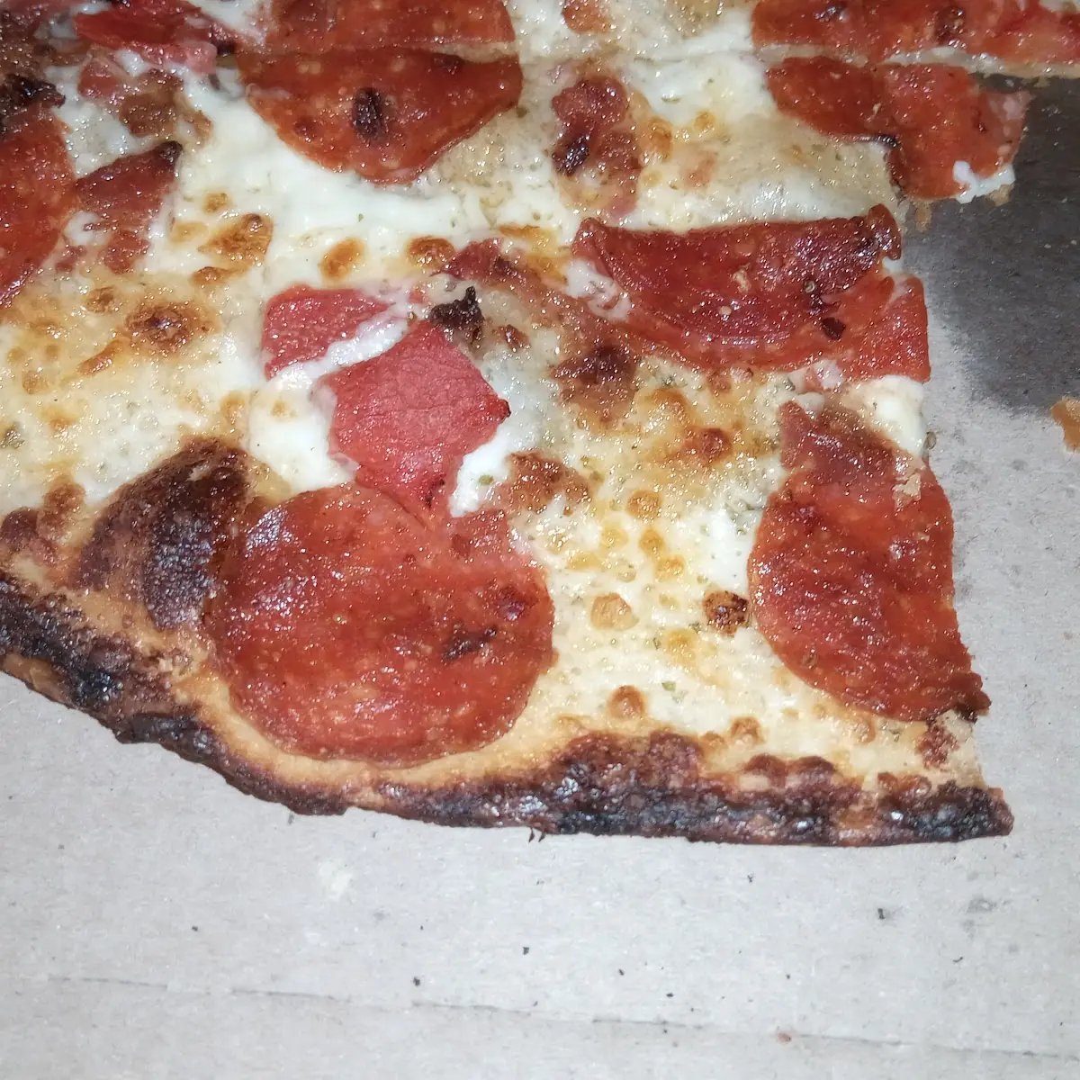 Why Is It Hard to Pull a Thin Crust Pizza Out of a Conventional Oven Before It Burns