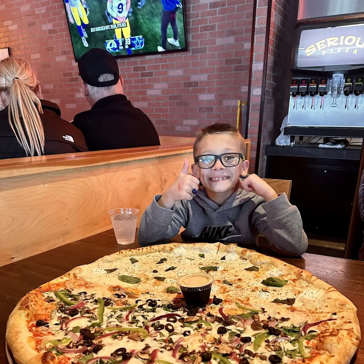Half Supreme Pizza Half White Pizza