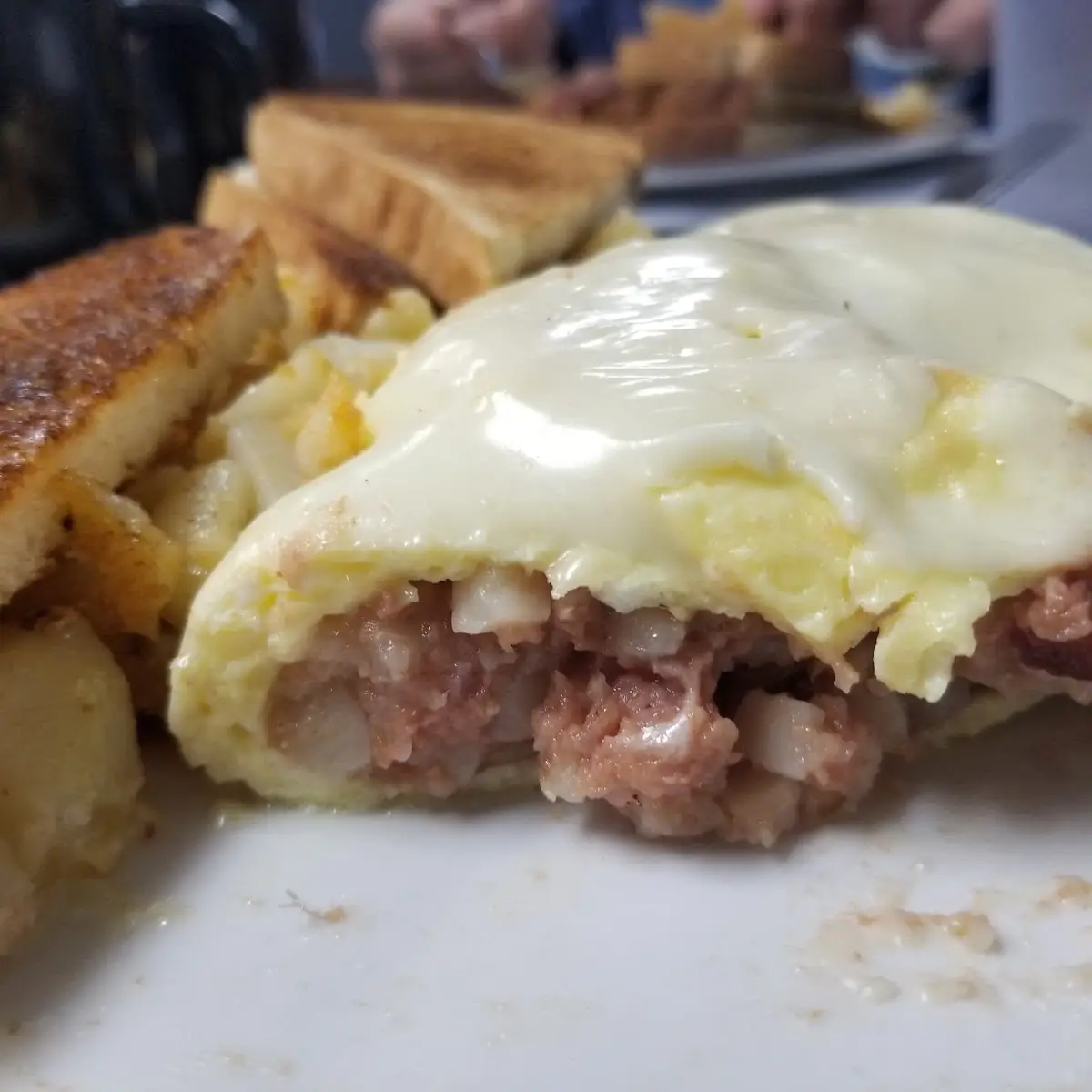 Stuffed Omelette with Cheese and Home Fries