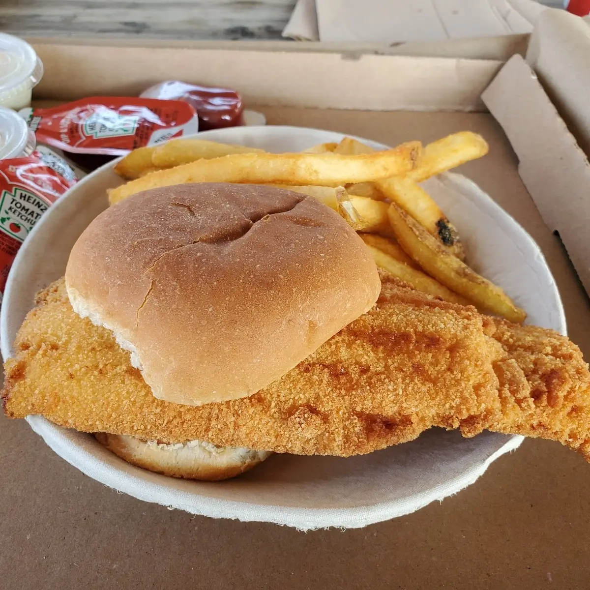 Haddock Sandwich with Fried Clam Strips Pink Plate Fried Shrimp and Fries and Mac Salad