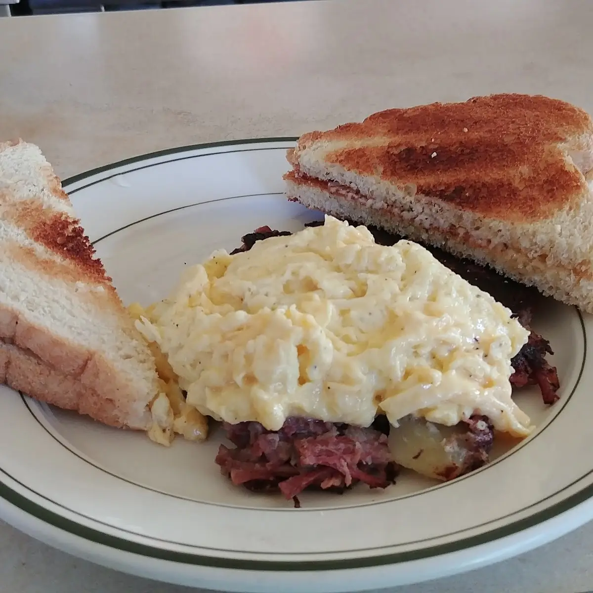 Corned Beef Hash Two Eggs and Toast
