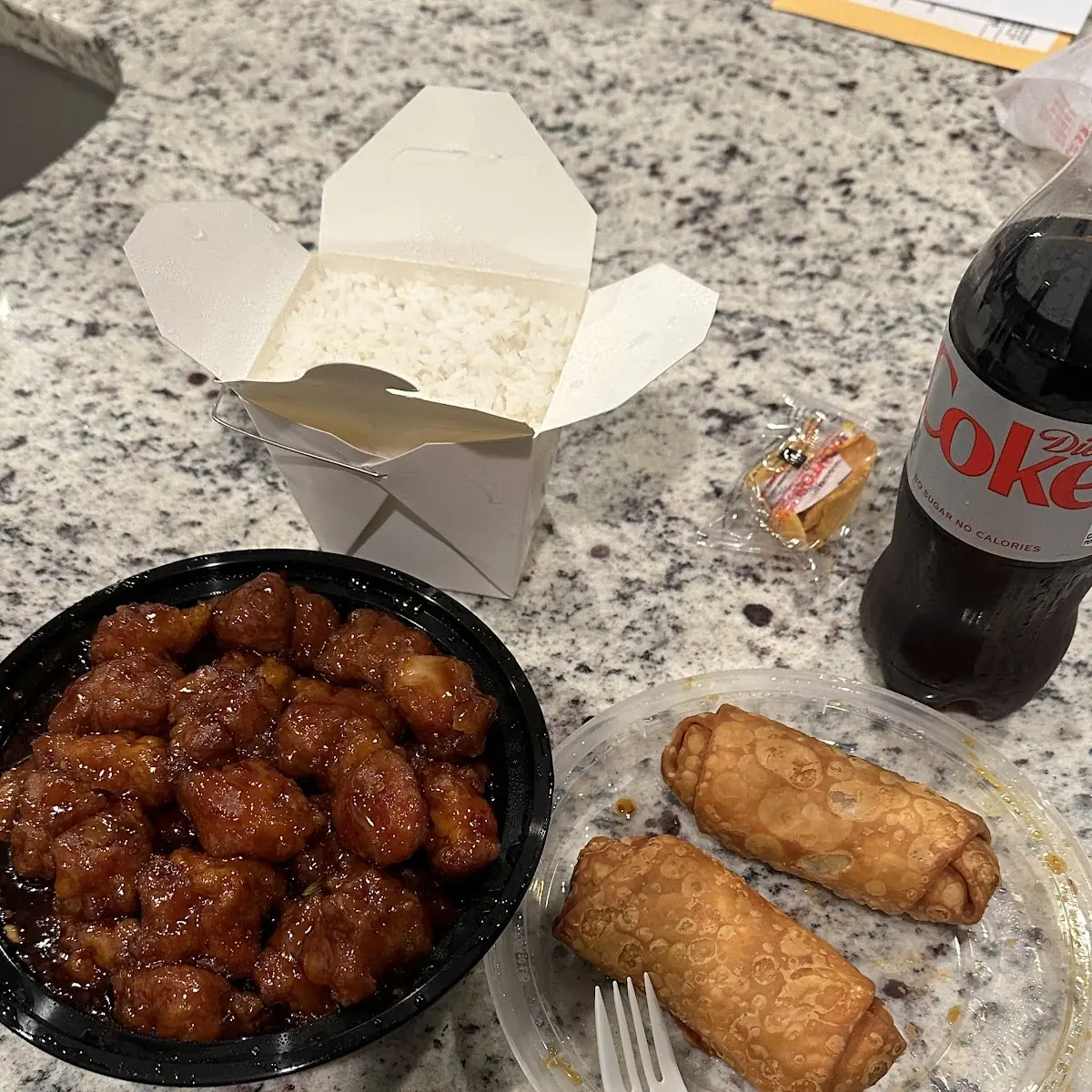 General TSO’S Chicken with Egg Rolls