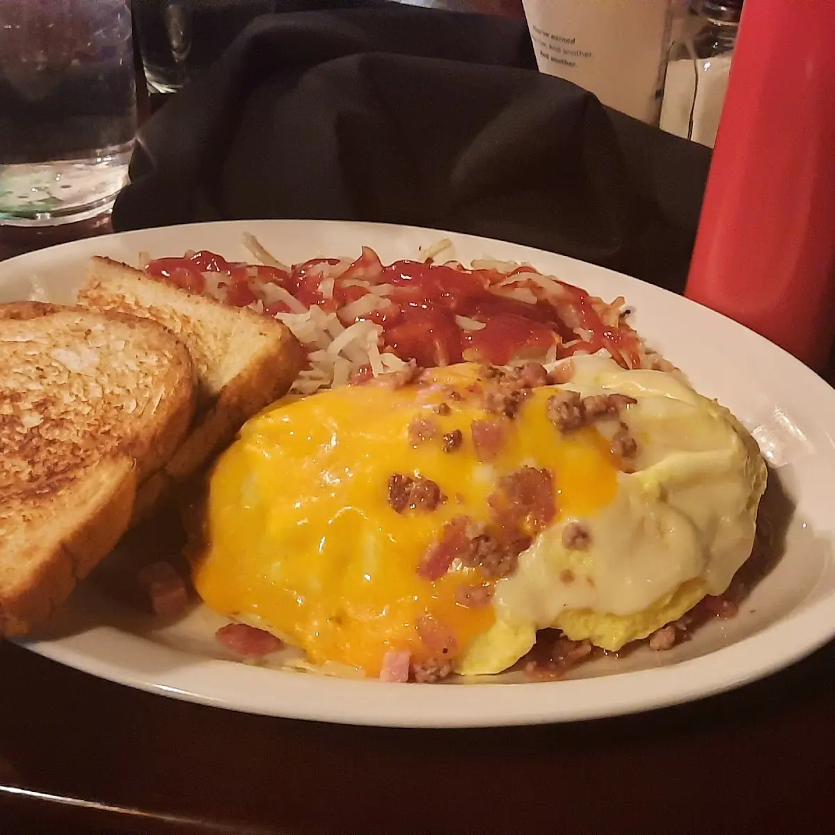 Ham Bacon Onion Pepper Jack and Cheddar Cheese Omelet