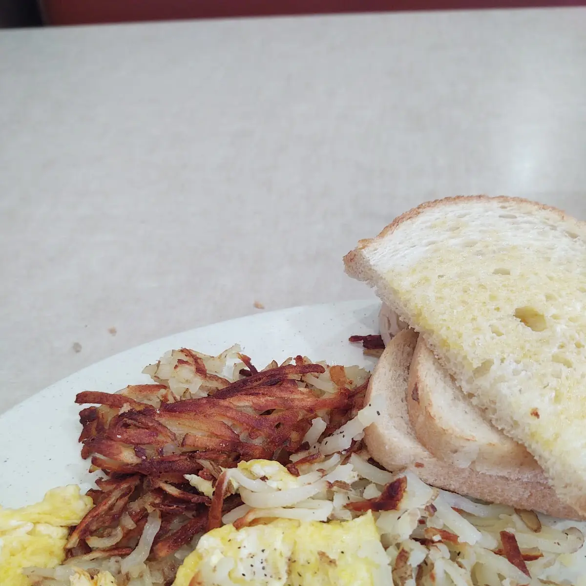 Three Egg Breakfast with Sausage Hash Browns Toasted Sourdough
