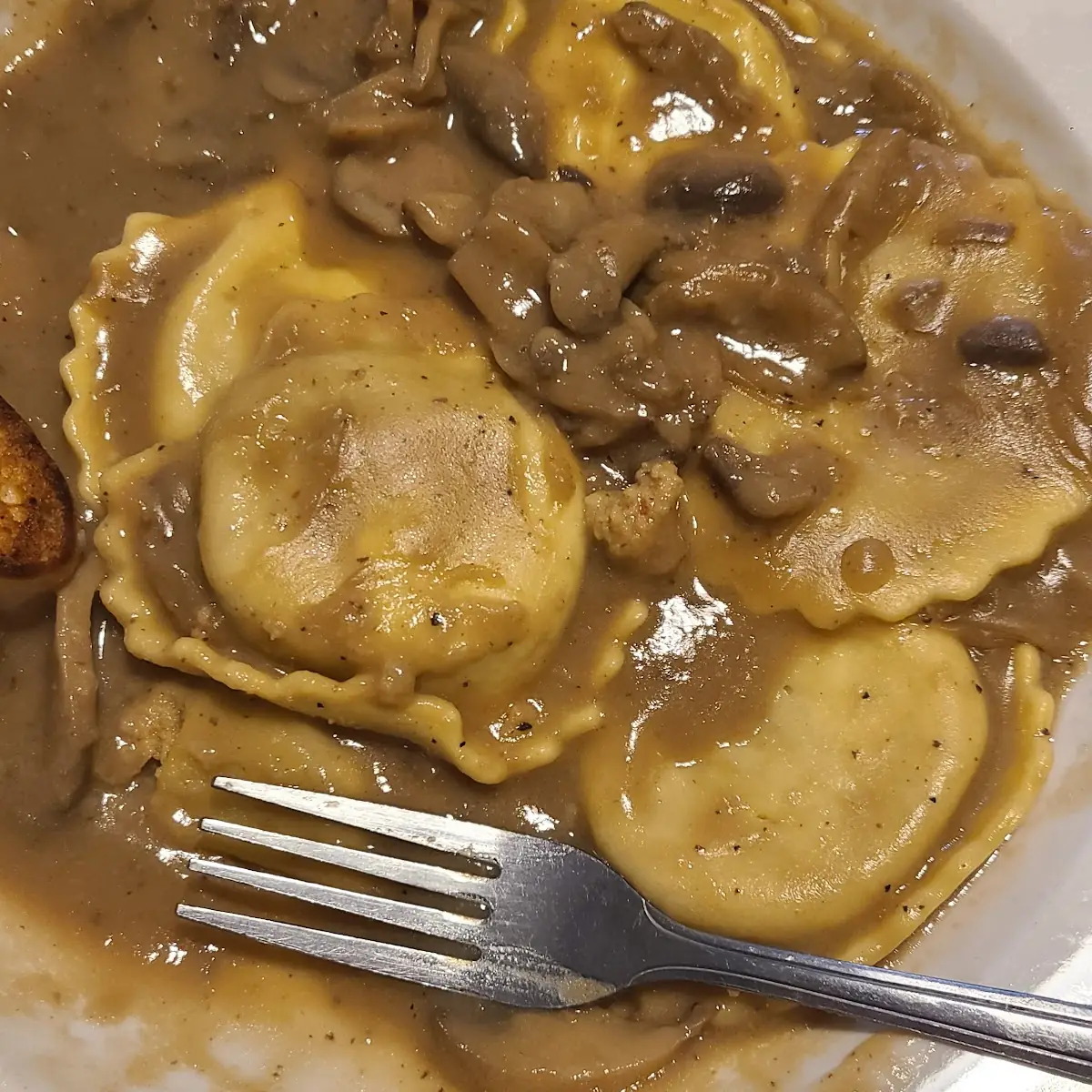 Meat Ravioli with Brown Gravy and Mushrooms
