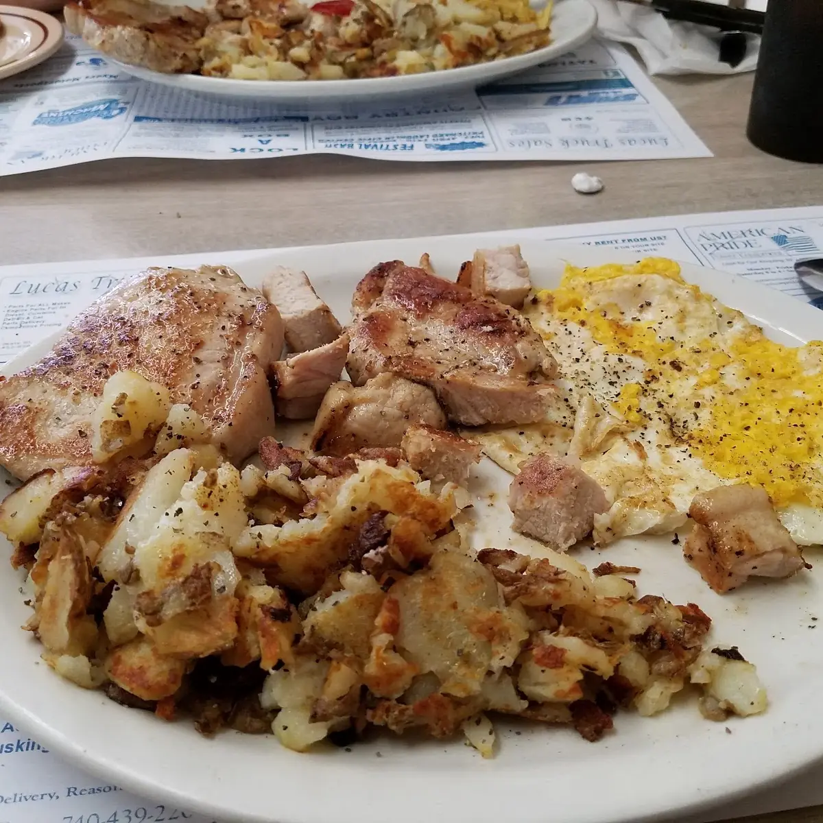 2 Pork Chop 2 Eggs Home Fries Breakfast