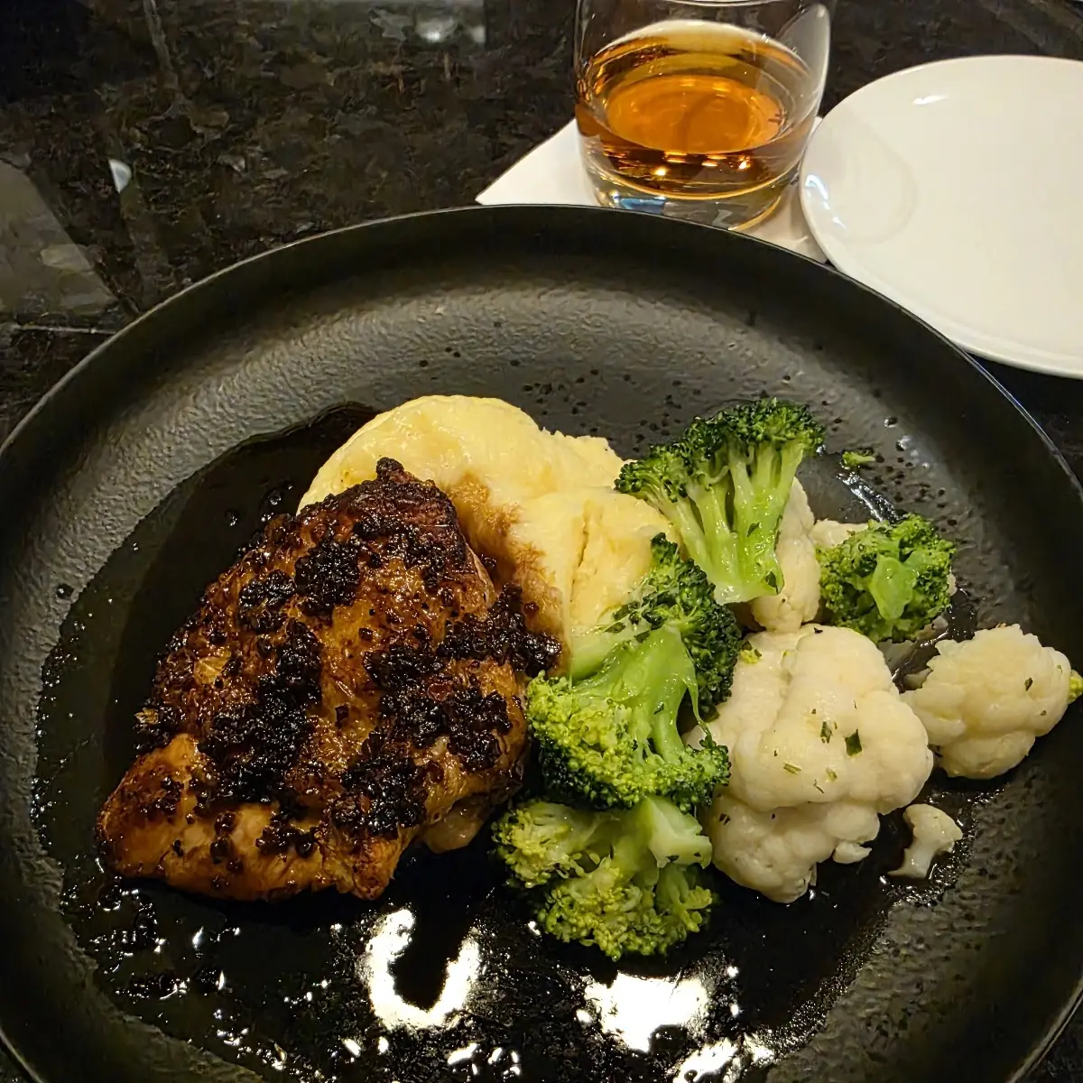 Herb Roasted Chicken over Mashed Potatoes with Vegetables