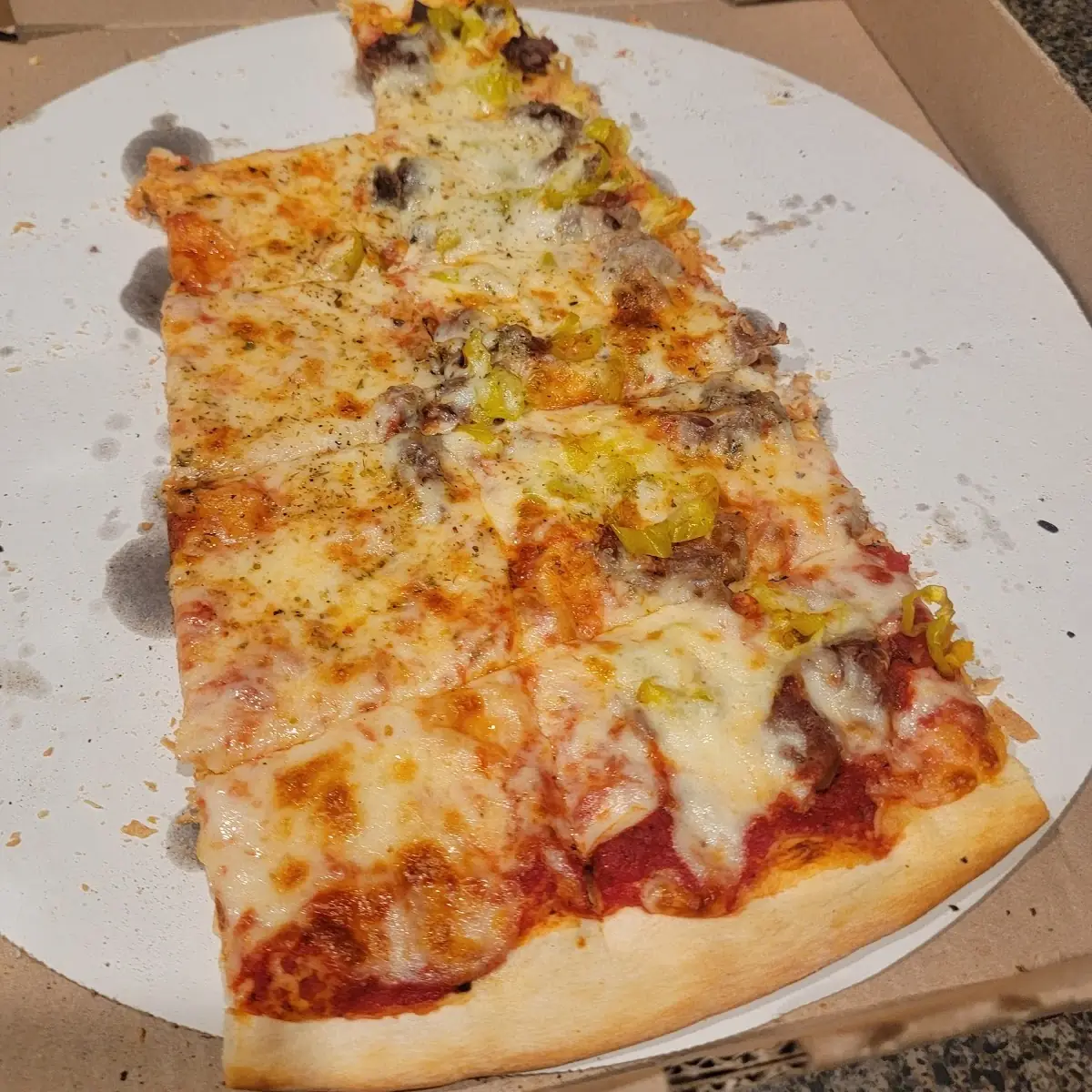 Thin Crust Cheese Pizza Half Sausage and Peperoncini