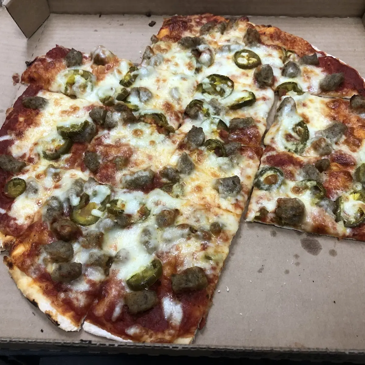 Thin Crust Sausage and Jalapenos Pizza