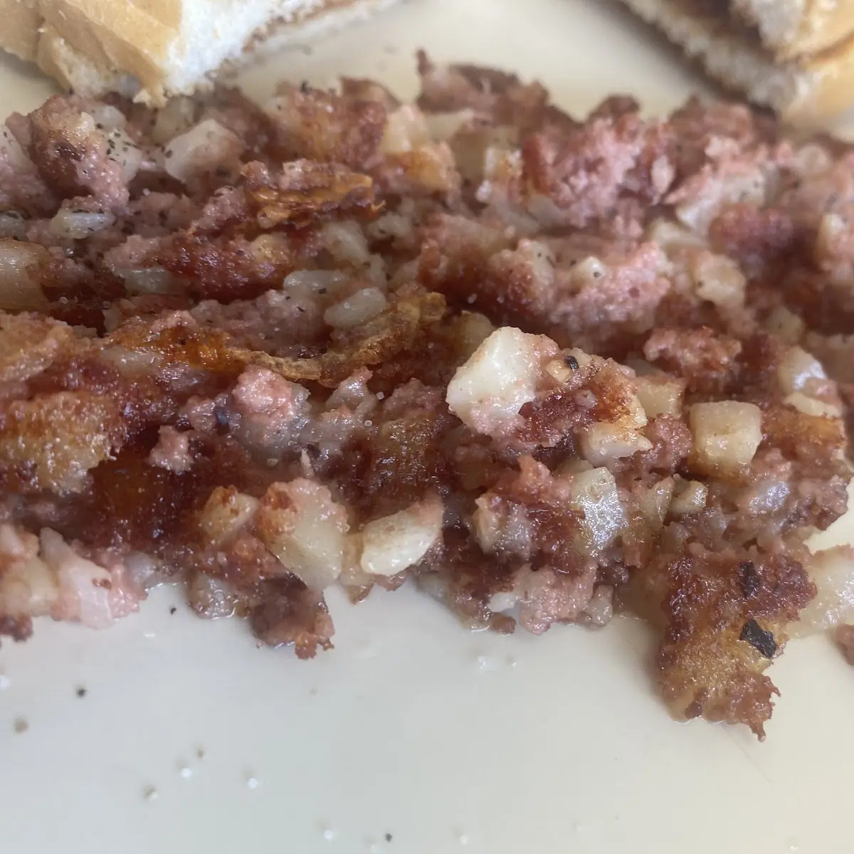 Corned Beef Hash, Eggs (2 pcs), and Toast