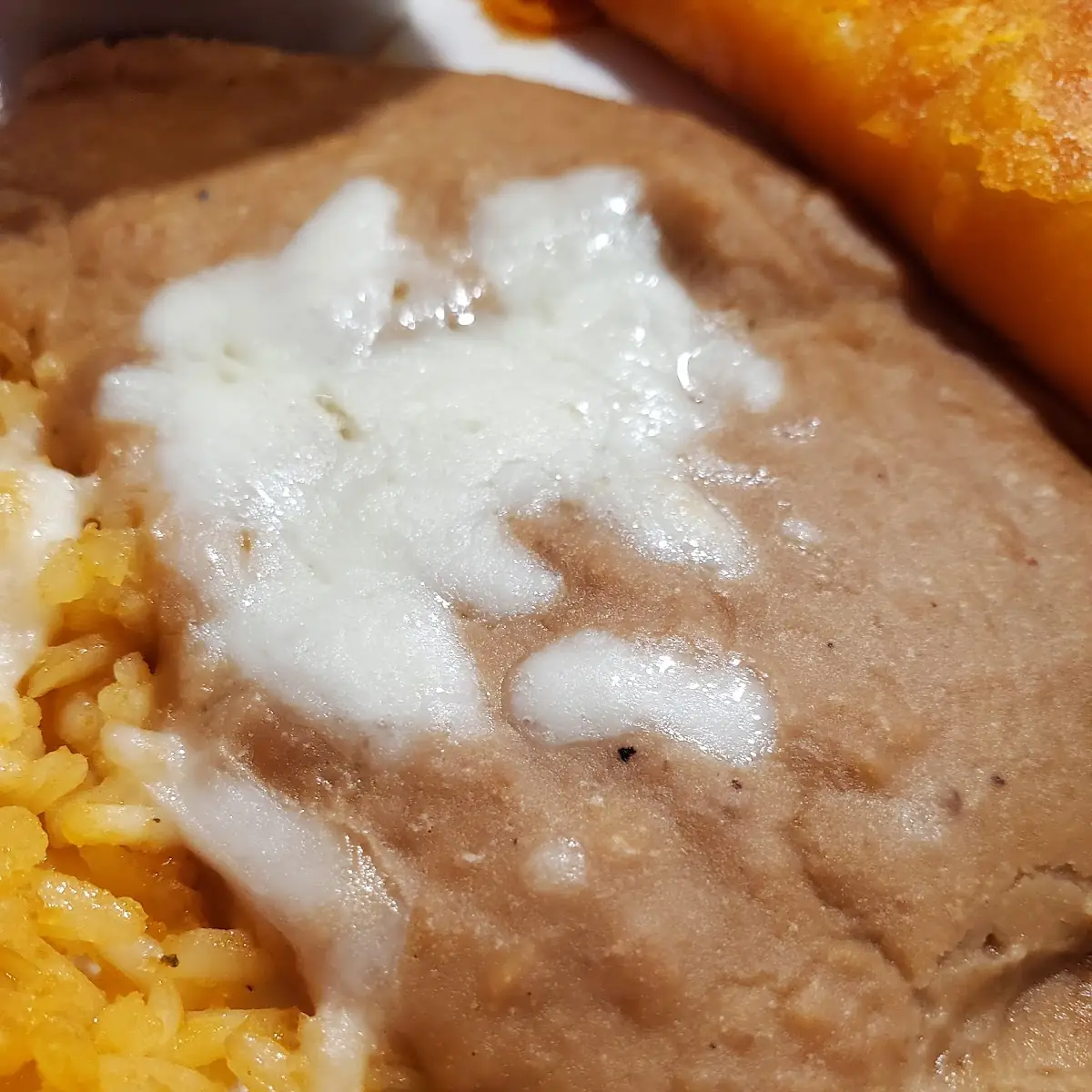 #6. One enchilada, one Chile Poblano Relleno, rice & refried beans
