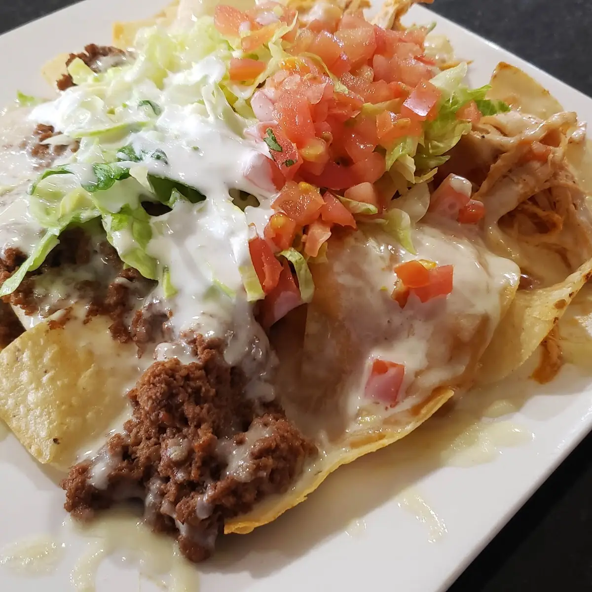 Beef Chicken and Cheese Nachos