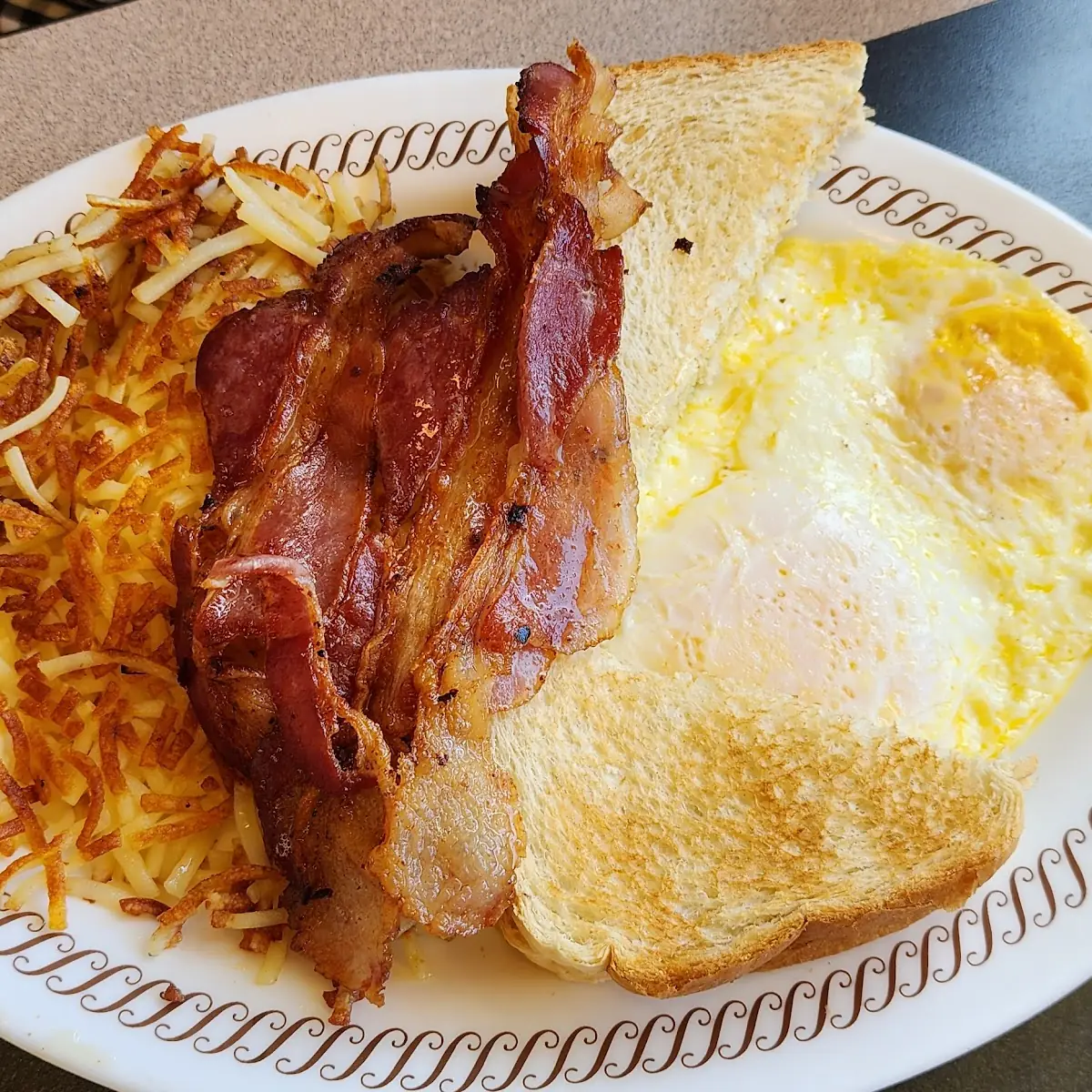 Eggs Hash Browns and Tbone Steak