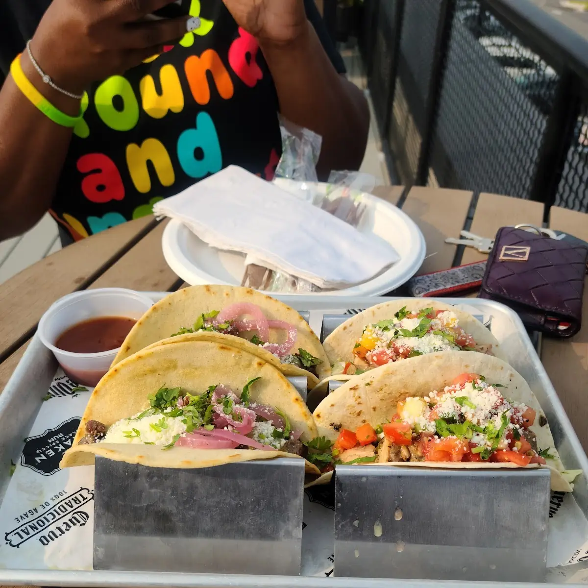 Jerk Chicken Taco and Carne Asada Taco