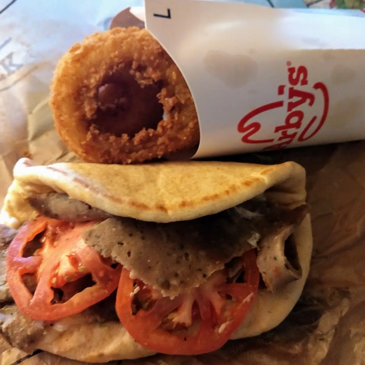 Gyro Meat Sandwich and Onion Rings