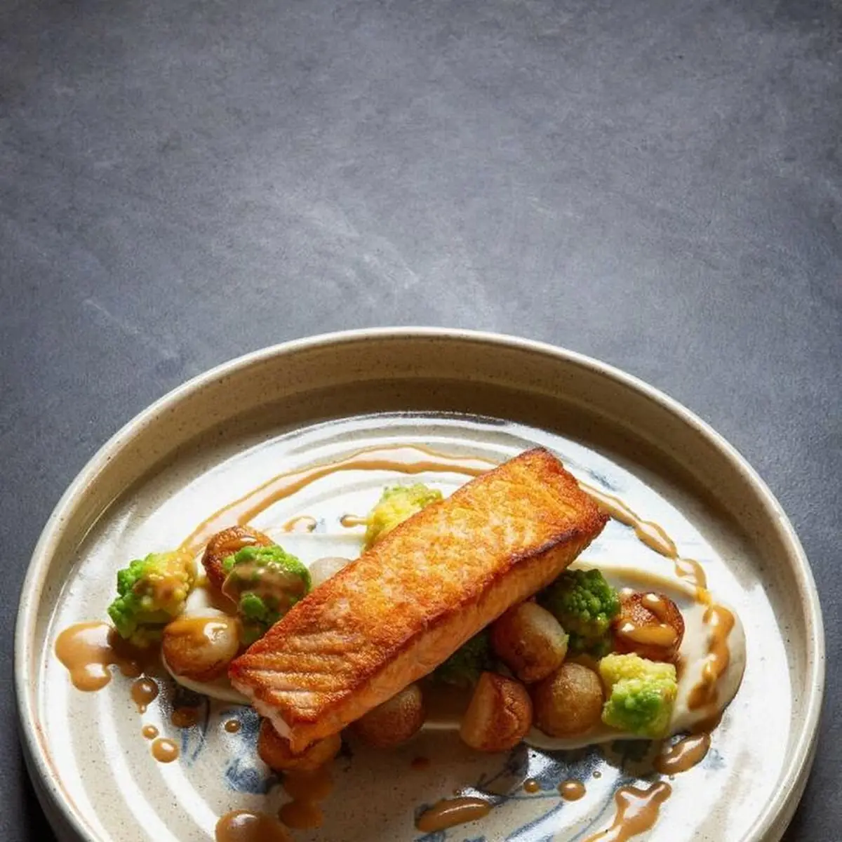 House-Cured & Smoked Salmon over a Disk of Twice Fried Confit