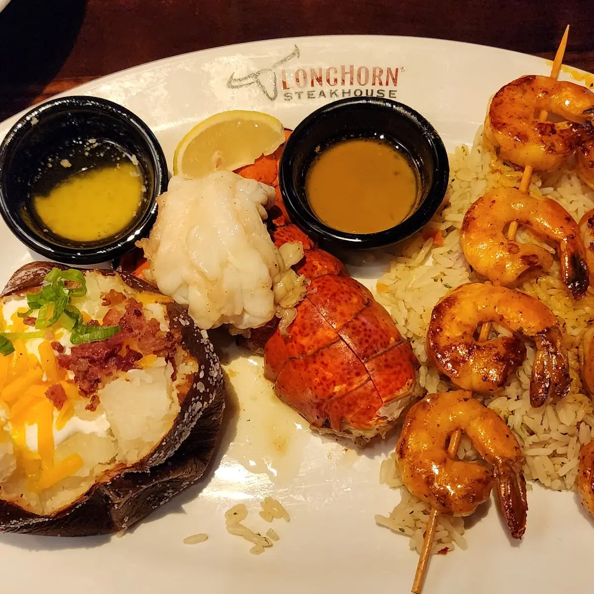 Ribeye Steak Shrimp Loaded Baked Potato