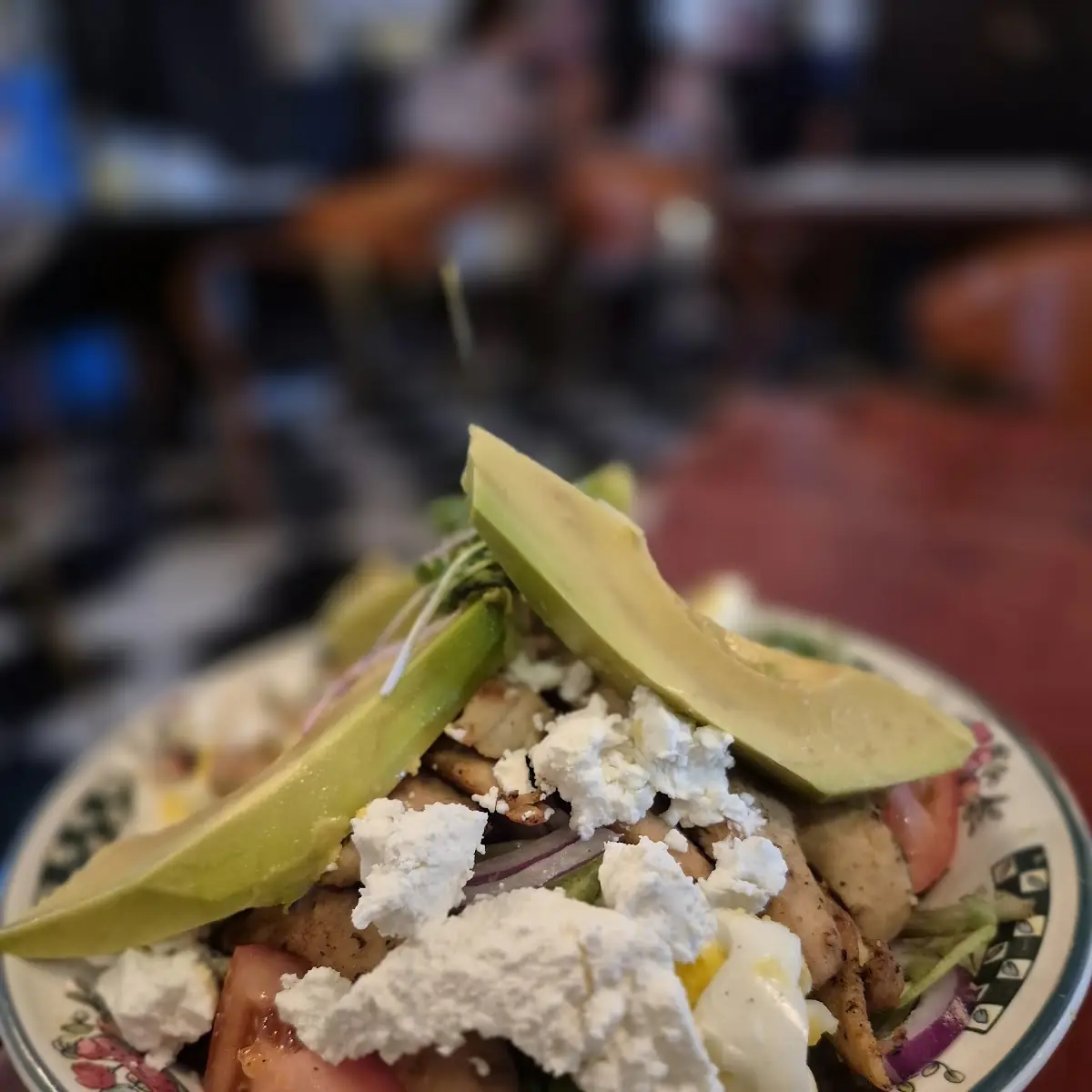 La Bodega Salad Mixed Greens with Chicken Avocado Goat Cheese and Onions