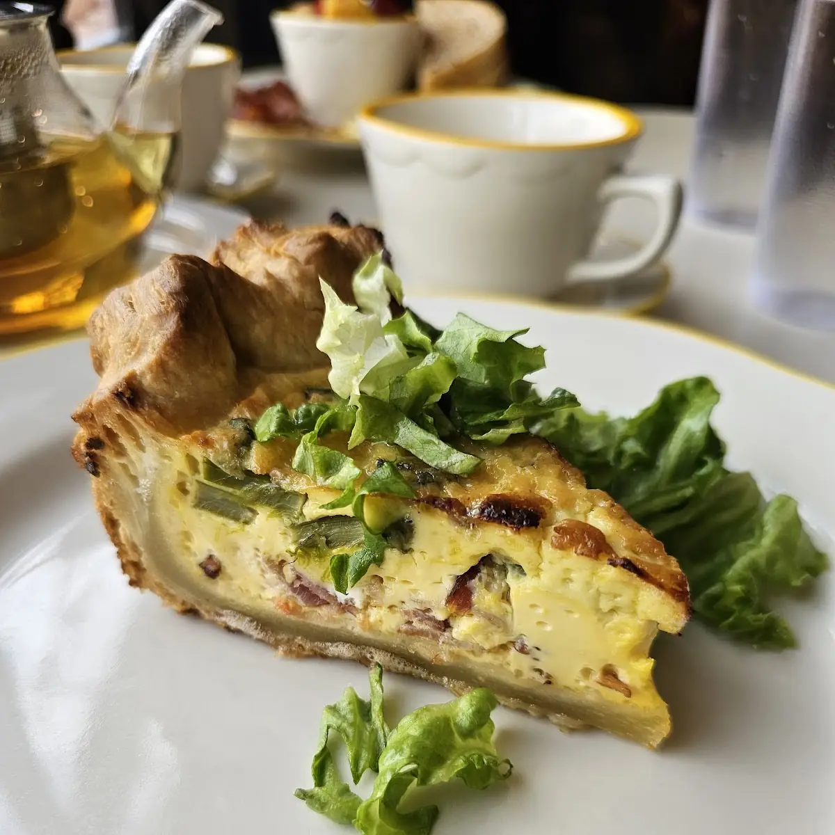 Quiche Slice with Microgreens Salad