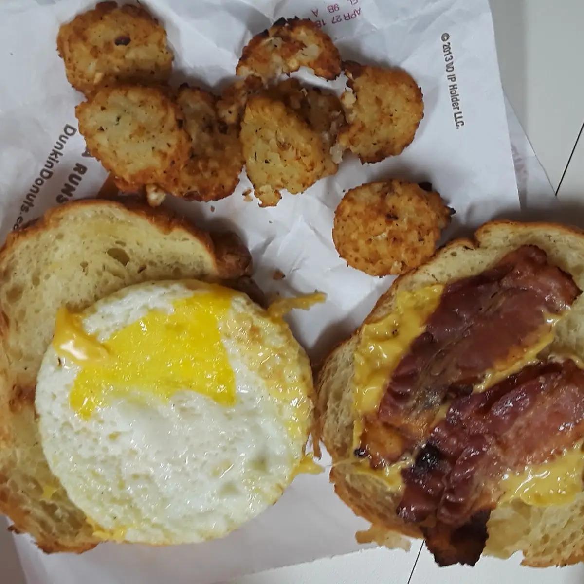 Bacon Egg and Cheese Croissant and Hash Browns