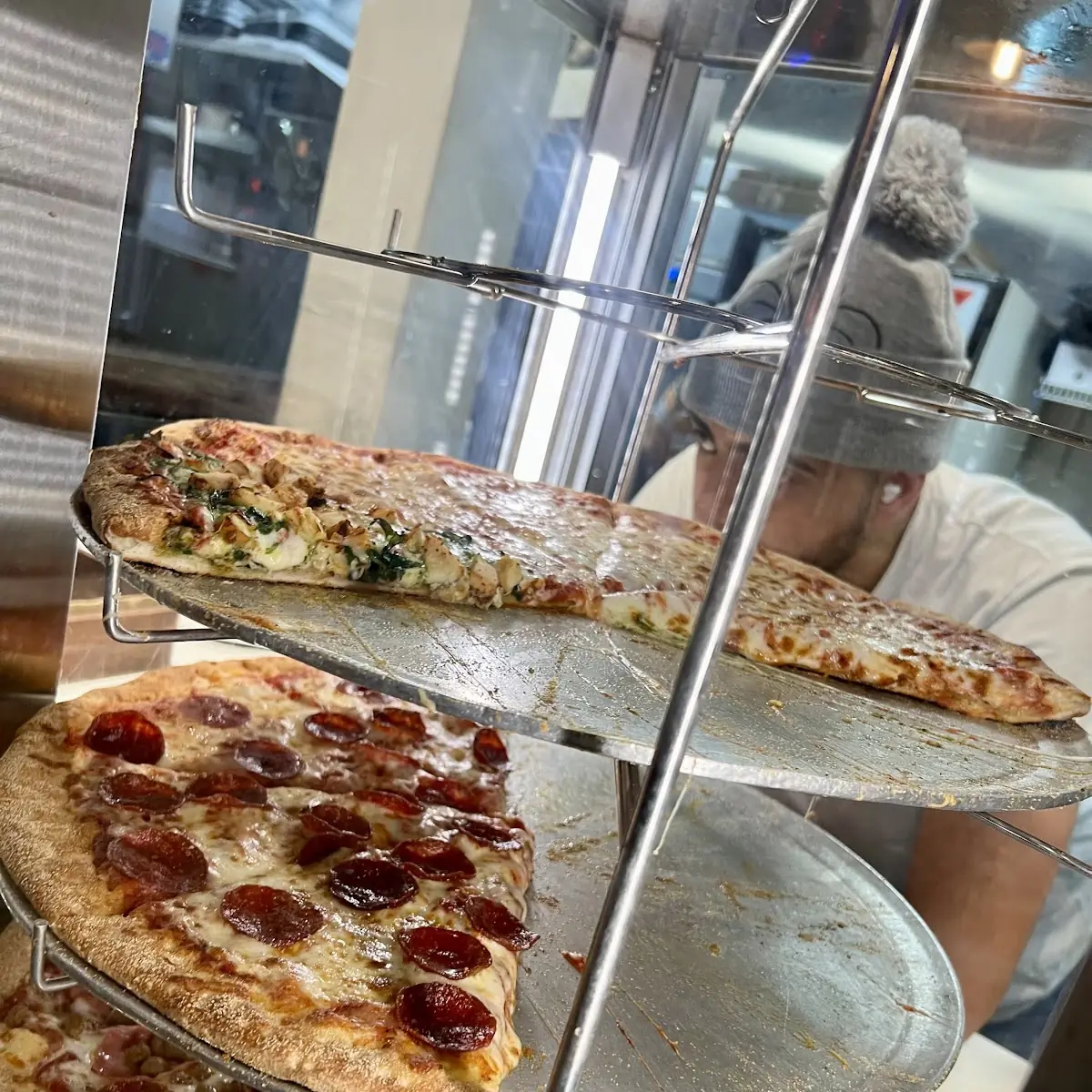 Assorted Pizza Slices on Display