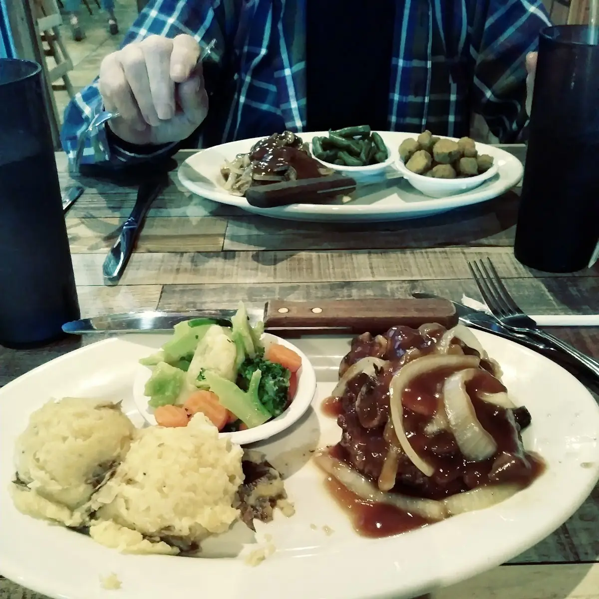 Hamburger Steak Grilled Onions Mushrooms Smashed Potatoes Mixed Veggies