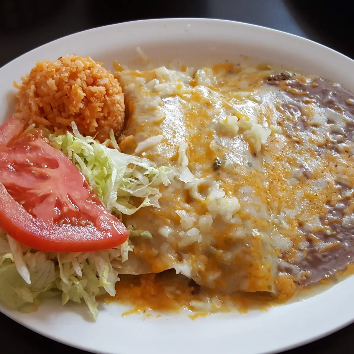 Combination Plate 2 Tacos an Enchilada Chili Relleno Rice and Beans