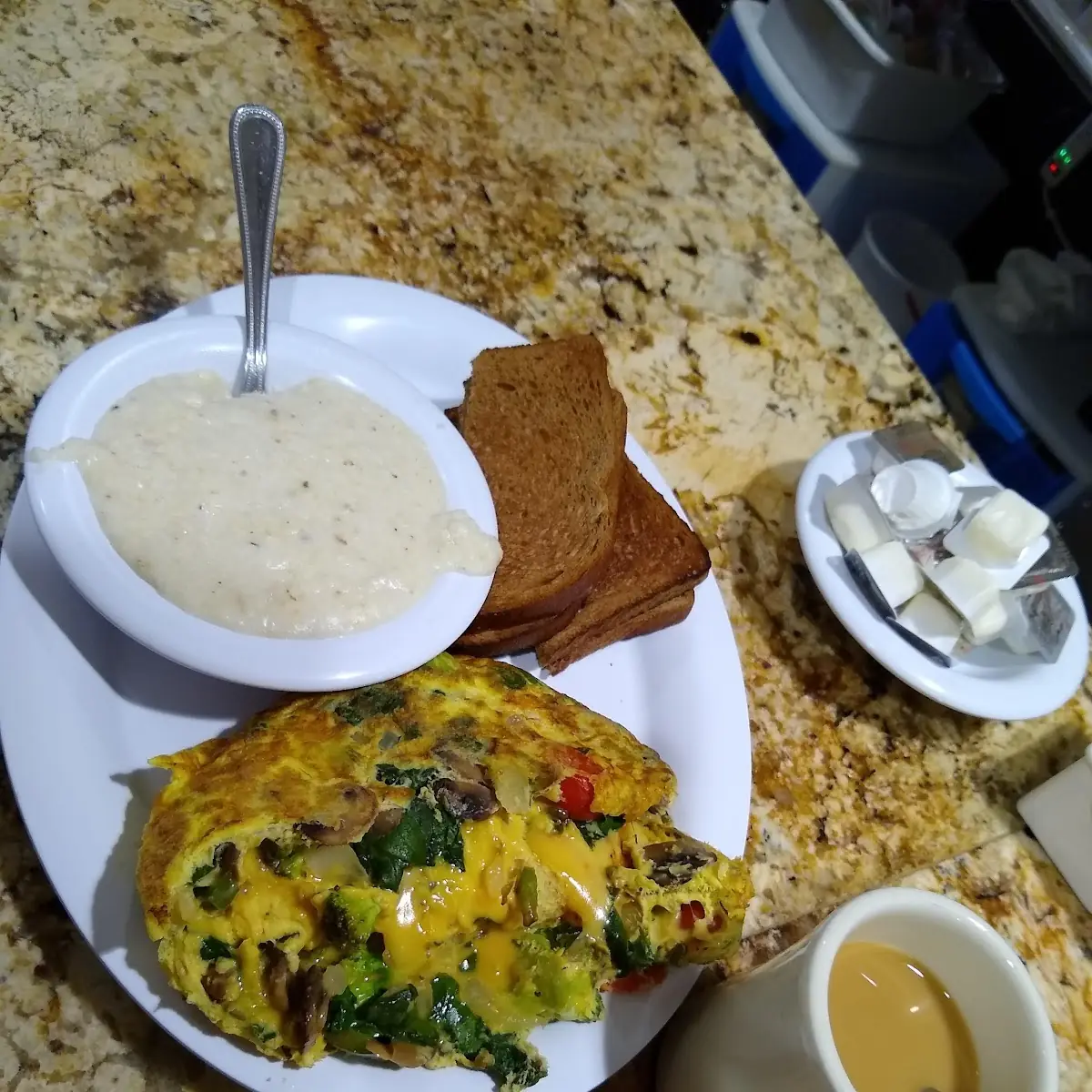 Veggie Omelette with Grits and Toast