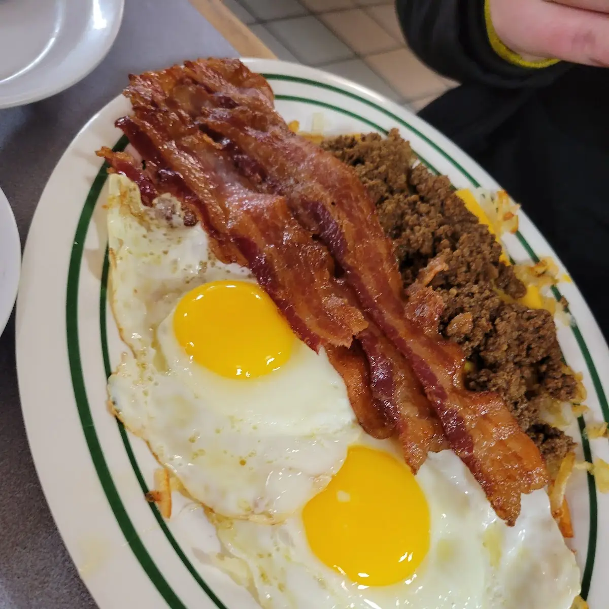 Bacon 2 Eggs Sunny Side Up and Loaded Hash Browns