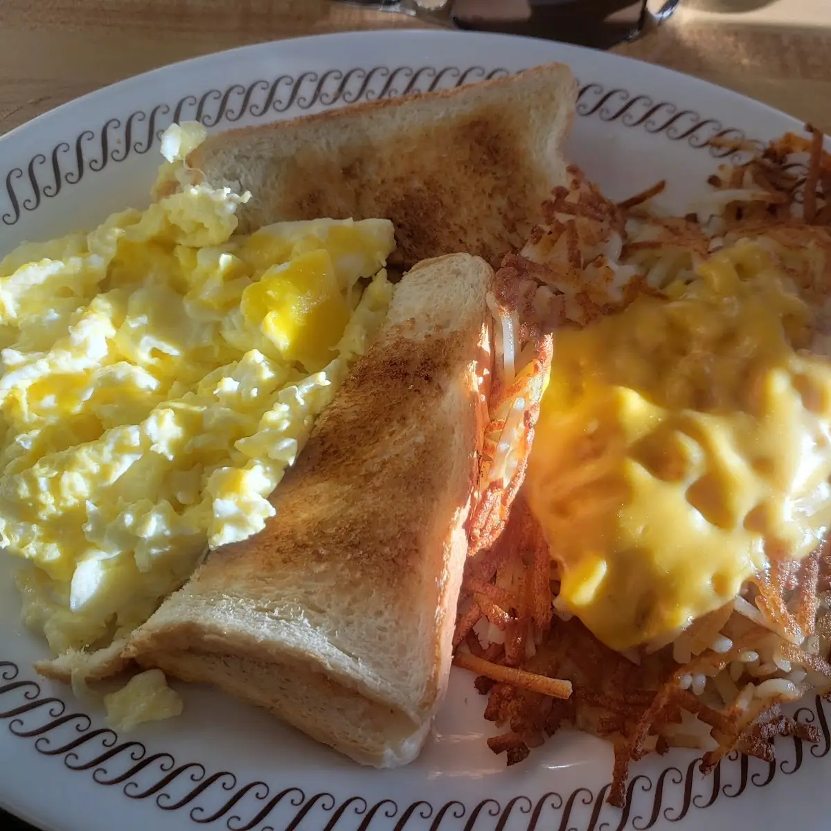 Scrambled Eggs and Toast with Hash Browns