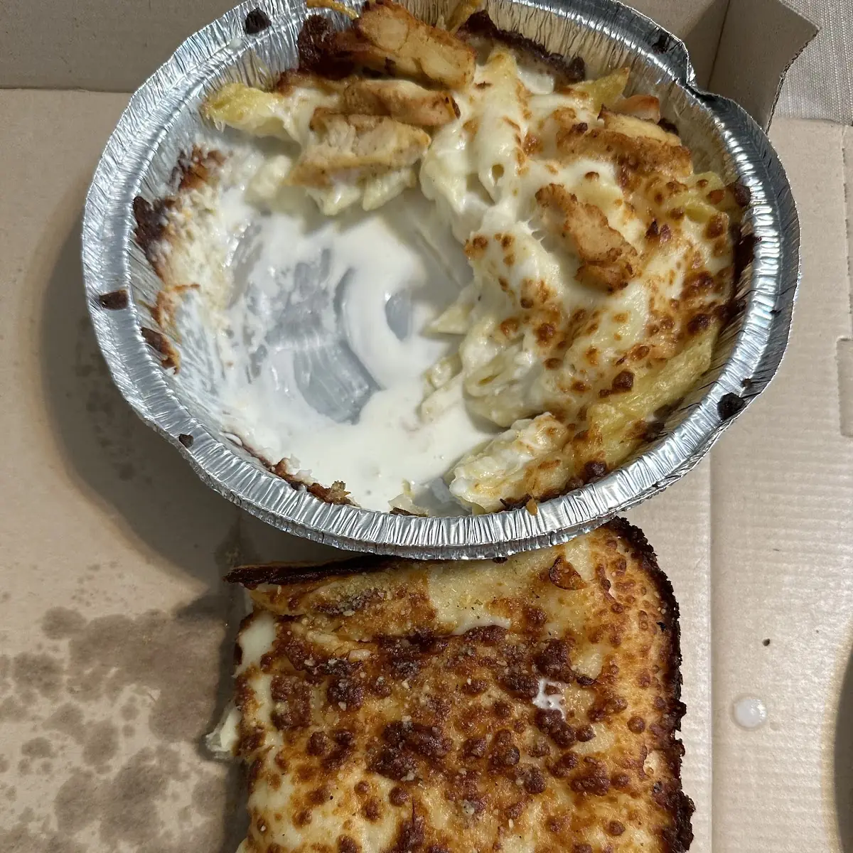 Chicken Pasta Alfredo and Cheese Pizza