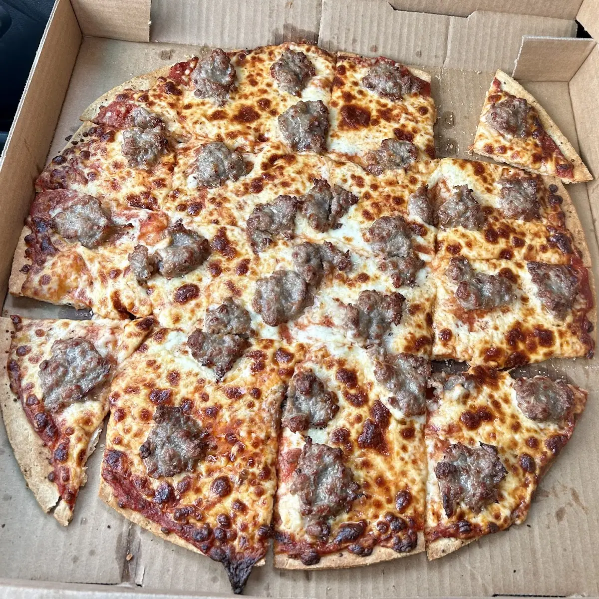 Thin Crust Cheese and Sausage Pizza