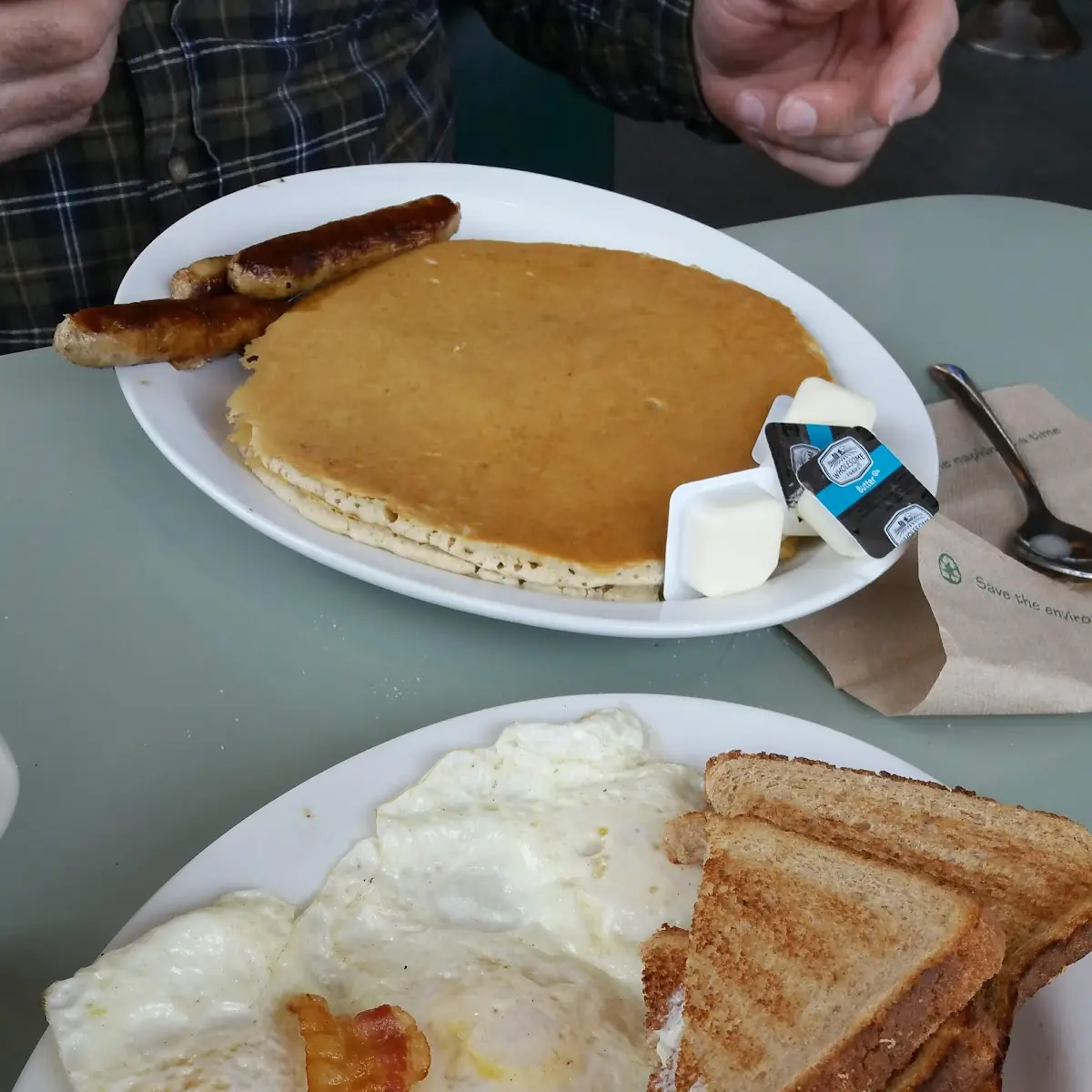 2 Eggs over Easy Bacon Hash Browns and Rye Toast