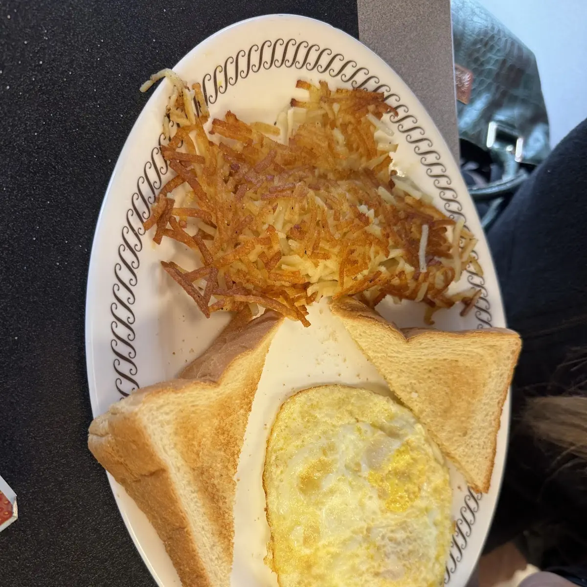 Two Eggs Med Well w Hash Browns