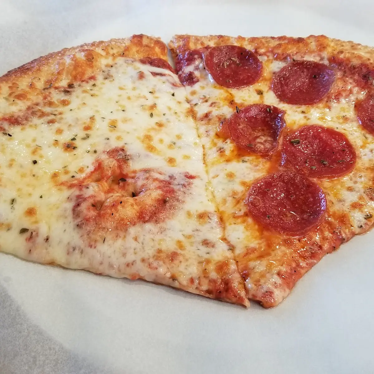 Plain and Pepperoni Pizza