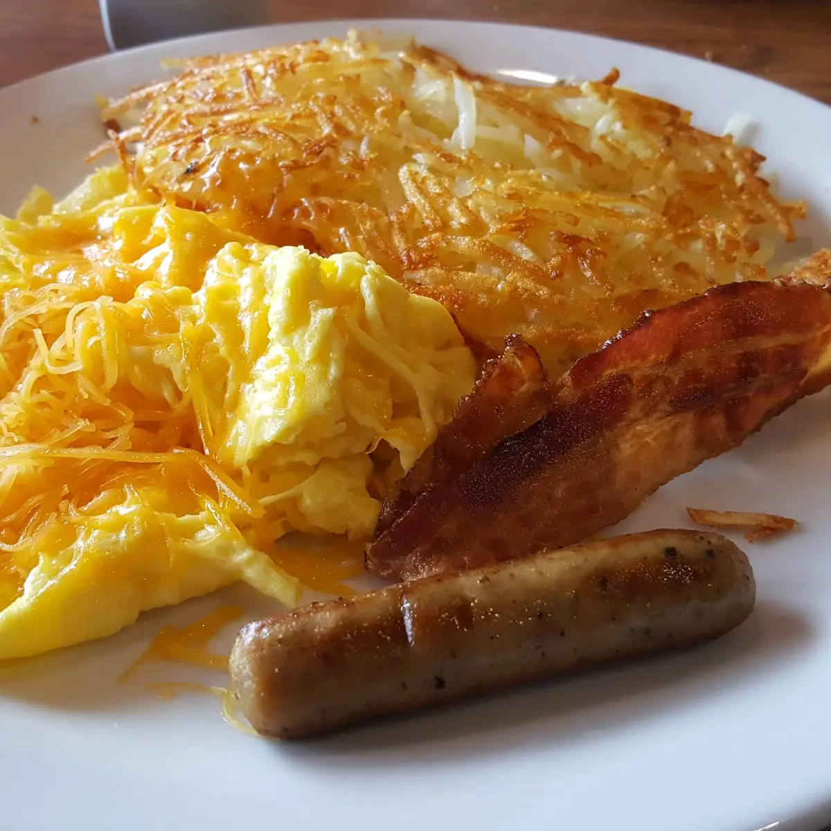 Scrambled Eggs and Cheese Hash Browns Bacon and Sausage