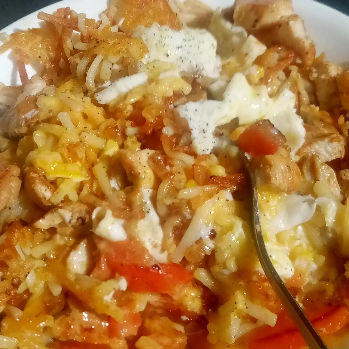 Grilled Chicken and Egg and Cheese Hash Brown Bowl
