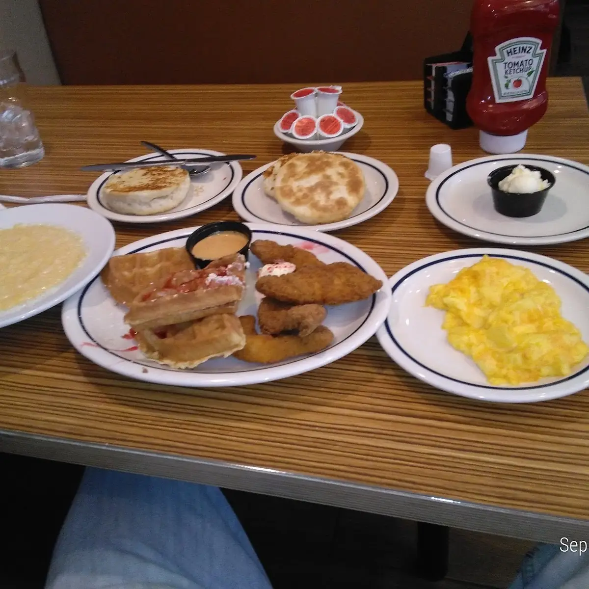 Cheesy Grits Cheesy Eggs Two Biscuits Sprite and Chicken and Waffles